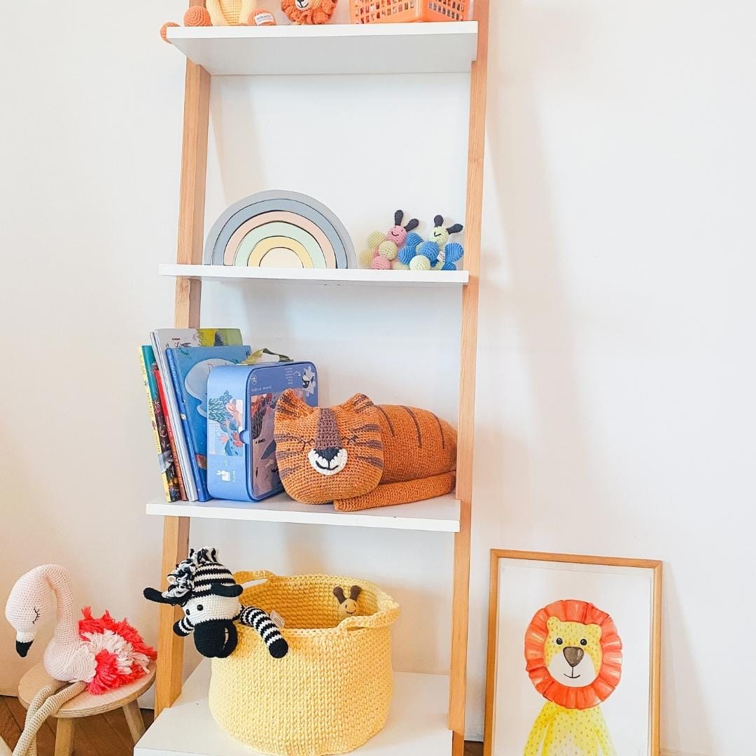 Handmade Torey the Tiger stuffed animal made from organic cotton, featuring orange and black striped fur and embroidered details.