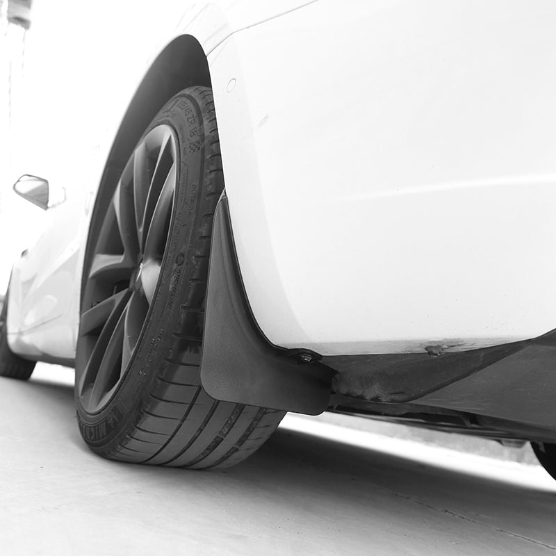 Tesla Model 3 Highland TESERY TPE+PP mud flaps installed on wheel arches, protecting the vehicle from dirt and debris.