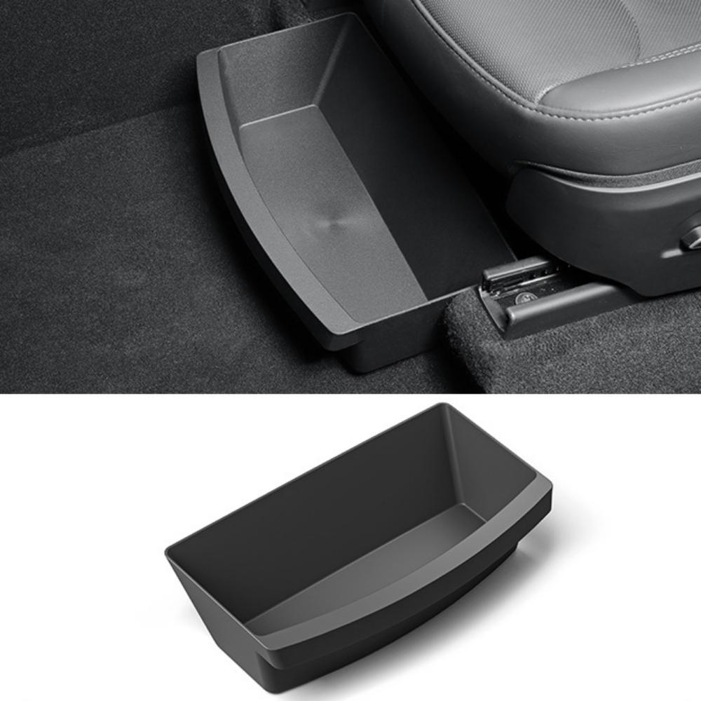 TPE under seat storage box for Tesla Model Y Juniper by TESERY, showing a sleek black storage container fitting under the seat.