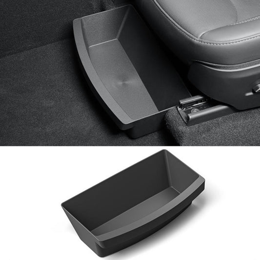 TPE under seat storage box for Tesla Model Y Juniper by TESERY, showing a sleek black storage container fitting under the seat.