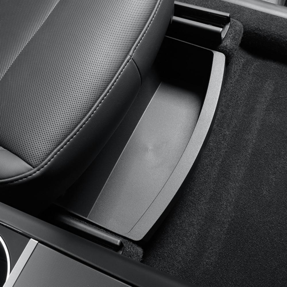 TPE under seat storage box for Tesla Model Y Juniper from Tesery, designed to organize and maximize under-seat space.
