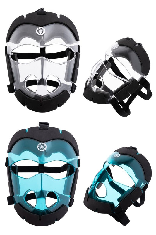 Aqua Indian Maharadja field hockey player wearing TREND Field Hockey corner face mask for protection during play.