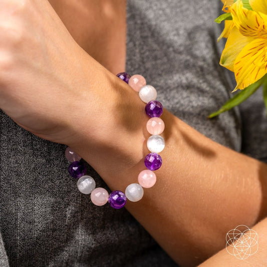 Conscious Items Trinity Bracelet of Stress Resilience featuring a sleek design with interconnected metal and bead accents.