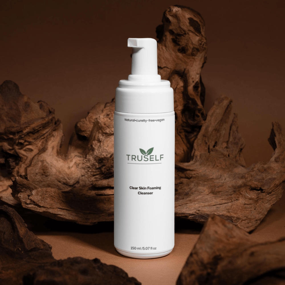TruSelf Organics Clear Skin Foaming Cleanser for skin care, showing the clean, bubbling foam formula in a clear container.