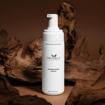TruSelf Organics Clear Skin Foaming Cleanser for skin care, showing the clean, bubbling foam formula in a clear container.