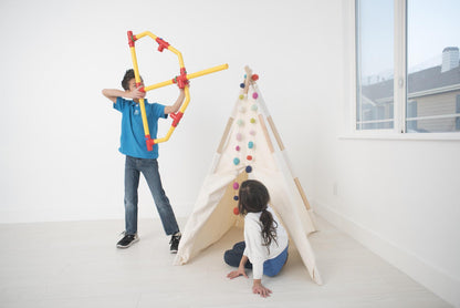 Two TubeLox Deluxe STEM toy sets with colorful tubes and connectors in primary colors, perfect for creative building and learning.