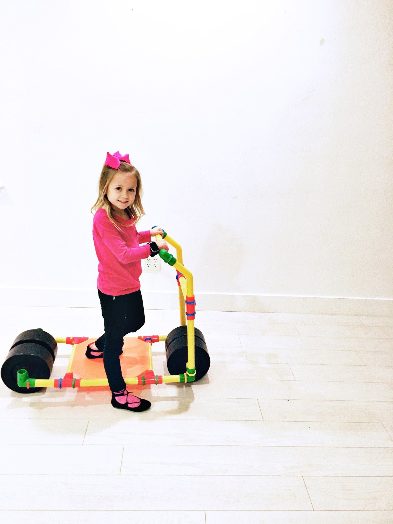 Two TubeLox Deluxe STEM toy sets with colorful tubes and connectors for creative building and educational play.