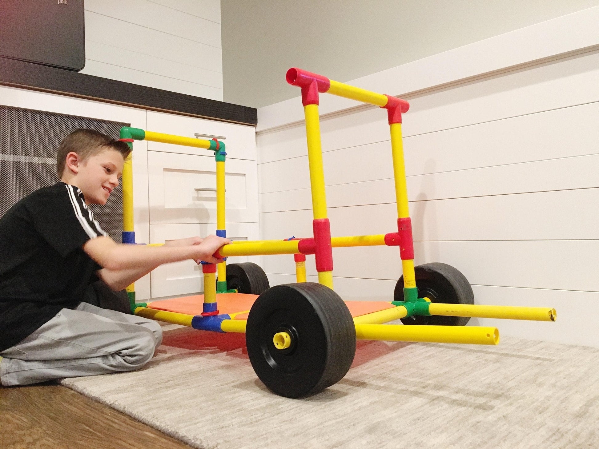 Two TubeLox Deluxe STEM toy sets with colorful tubes and connectors for creative building and STEM learning activities.