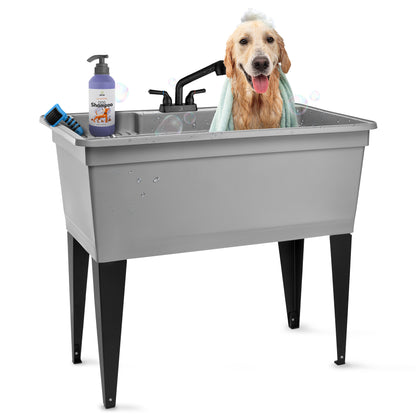 Grey freestanding double-wide utility sink with steel legs and black pull-out faucet, ideal for laundry or kitchen use.