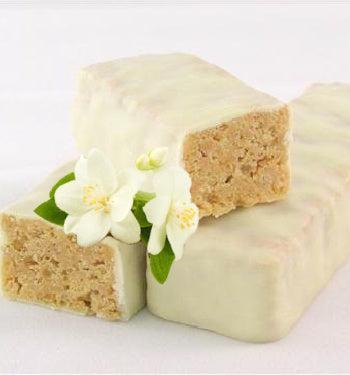 AmBari Nutrition vanilla shortbread bars on a plate, showcasing crispy, golden-brown cookies with vanilla flavor.