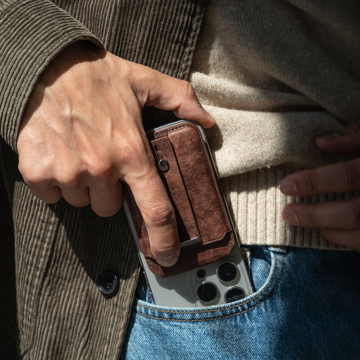 Robust magnetic cardholder wallet with multiple card slots and sleek black design, shown with cards inserted.