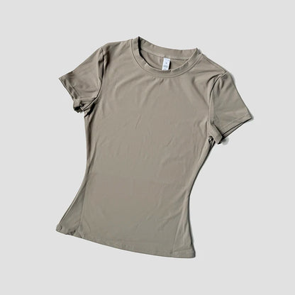 Navy women’s seamless yoga top by WAREBALL, short sleeve athletic shirt for fitness, gym, running, and active wear.