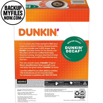 Four Dunkin' Decaf Medium Roast Coffee Keurig K-Cup pods in a box, watermarked image showing the product packaging.