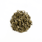 Organic White Prakash tea by Nepal Tea, showing fresh, white tea leaves in a natural, appealing arrangement