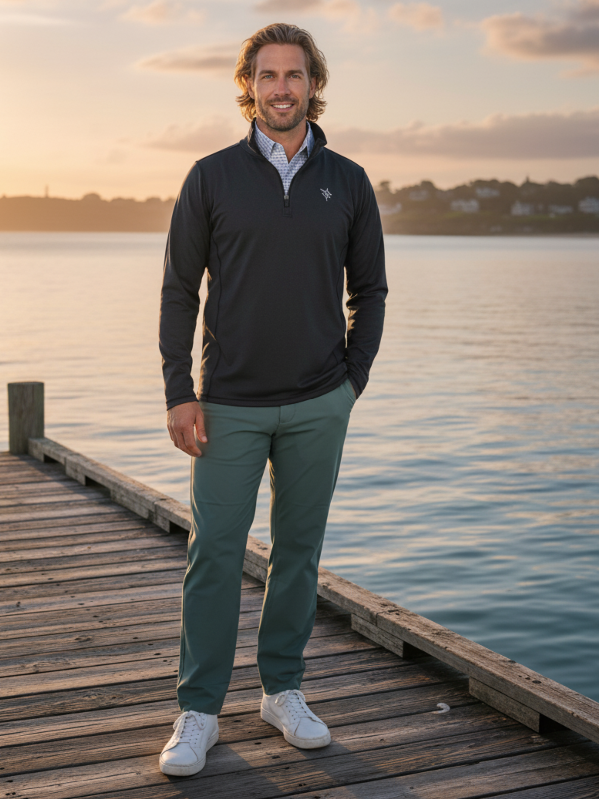 Green Seaport Pants by White Water Life, featuring a relaxed fit and durable fabric, displayed on a casual dock setting.