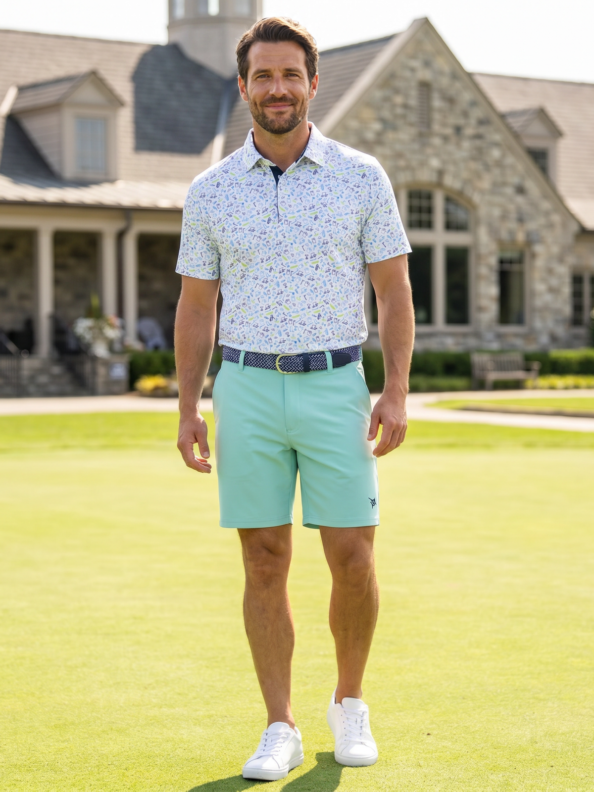 White Water Life Links Print Polo shirt with aqua and white pattern, short sleeves, and classic polo collar.