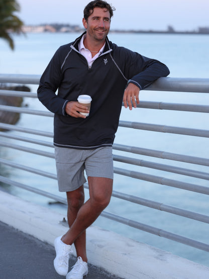 Navy blue White Water Life quarter zip pullover from New Harbor collection, showcasing its casual, effortless comfort design.