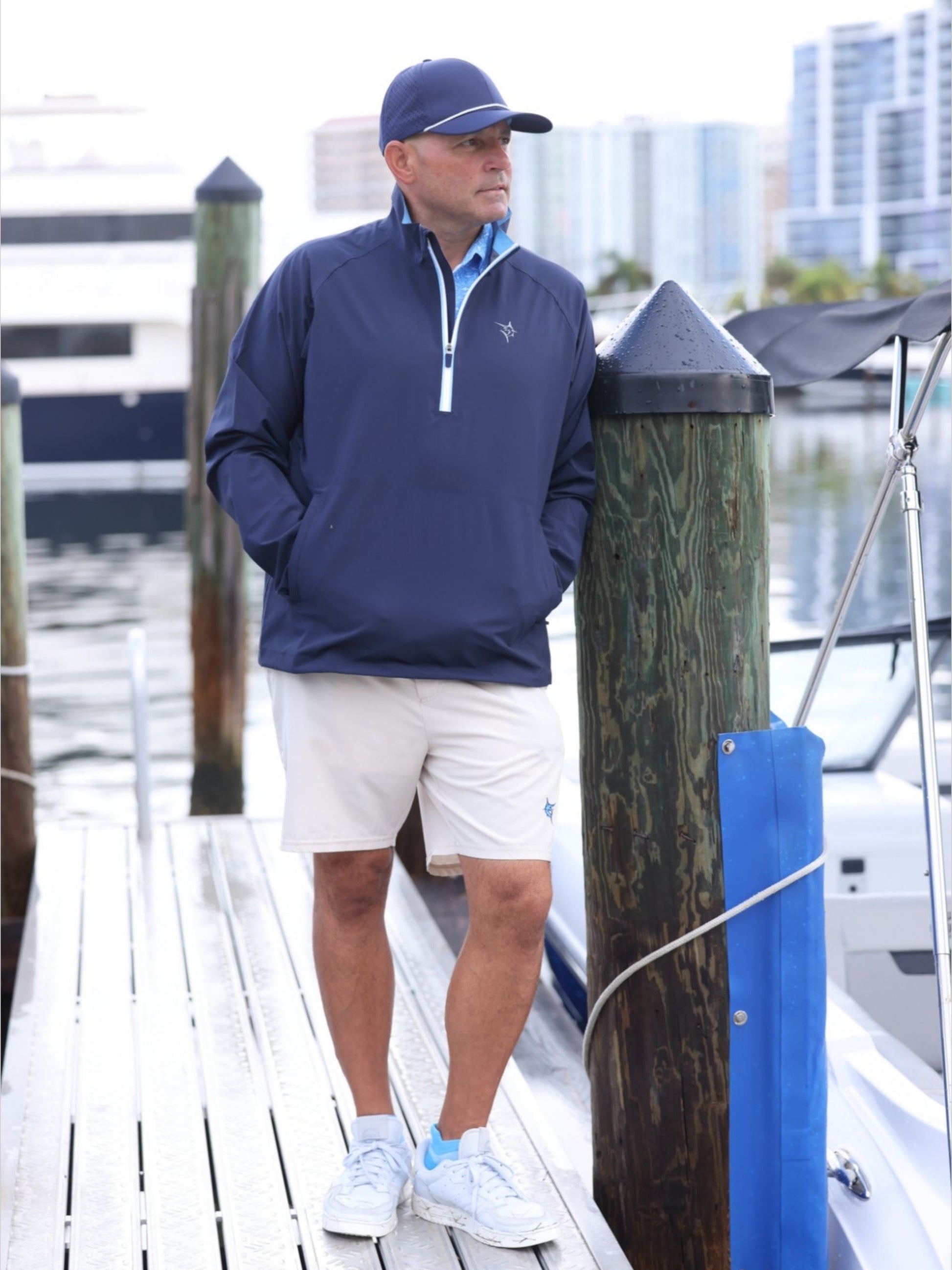 White Water Life Palm Beach waterproof quarter zip jacket, shown in navy with a front zipper and stand collar.