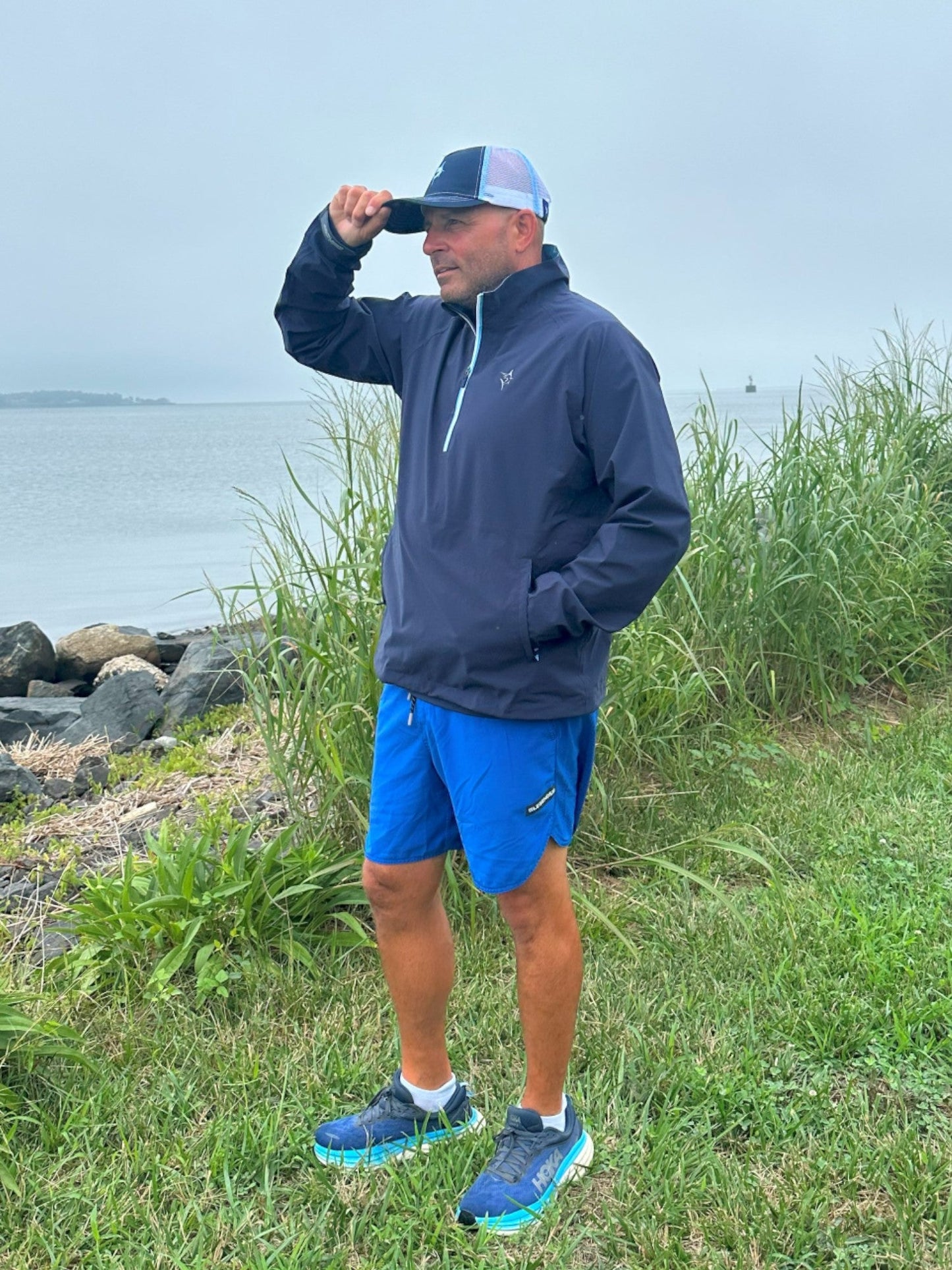 White Water Life Palm Beach waterproof quarter zip, lightweight outdoor jacket with quarter-zip neckline and waterproof fabric.