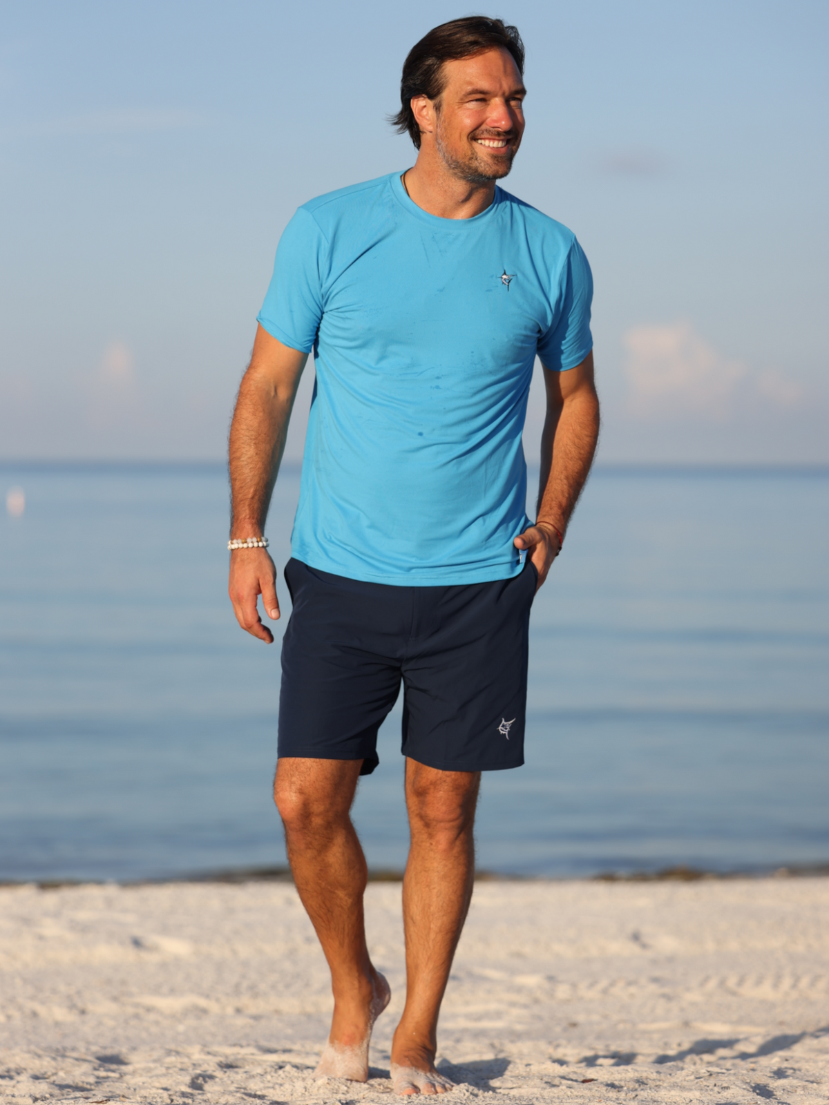 White Water Life Grander short sleeve performance tee shown on a model, lightweight athletic fabric, casual fit, ideal for active wear.