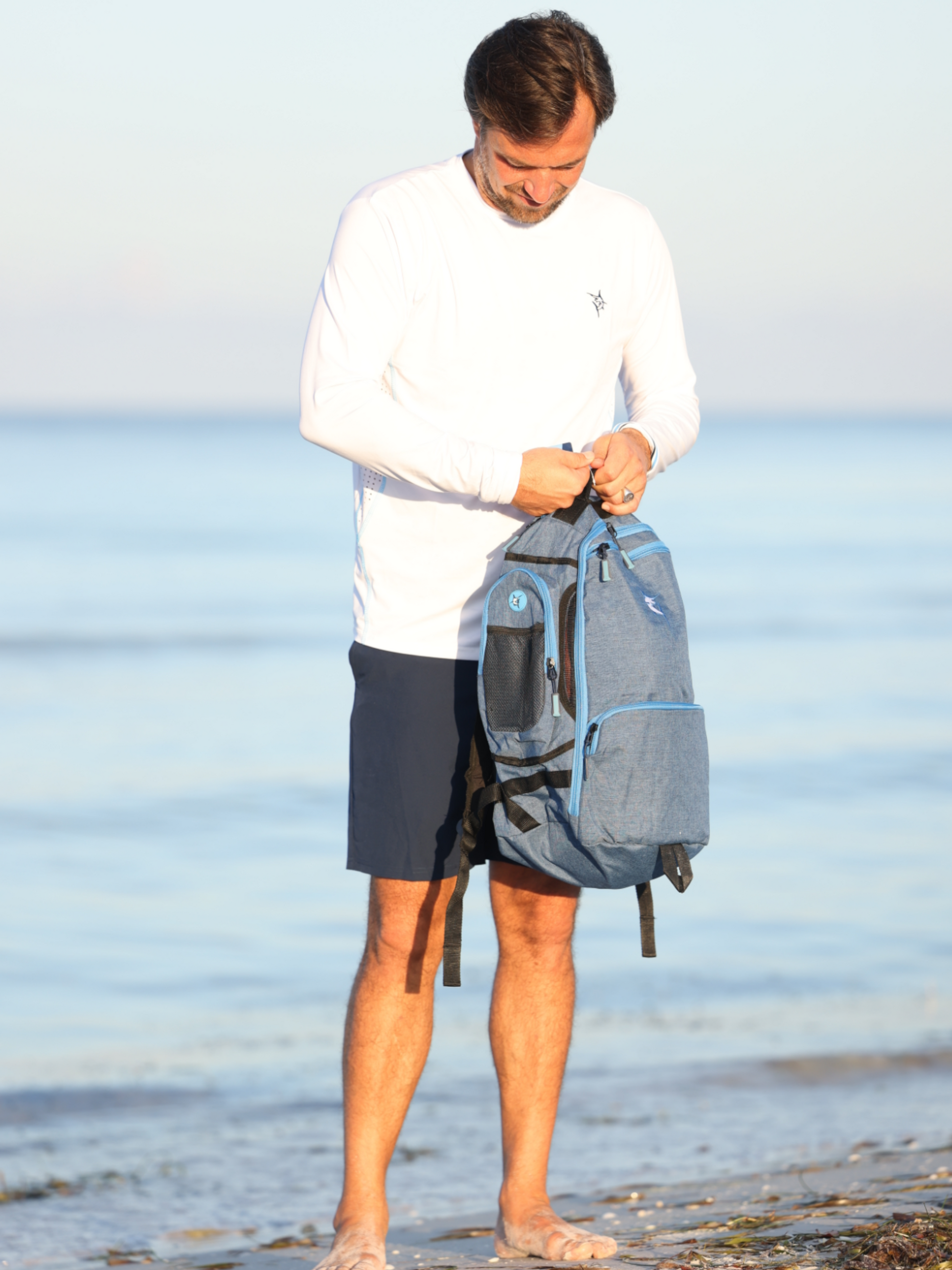 Simple white water life day trip backpack with adjustable straps and multiple compartments, ideal for outdoor adventures.
