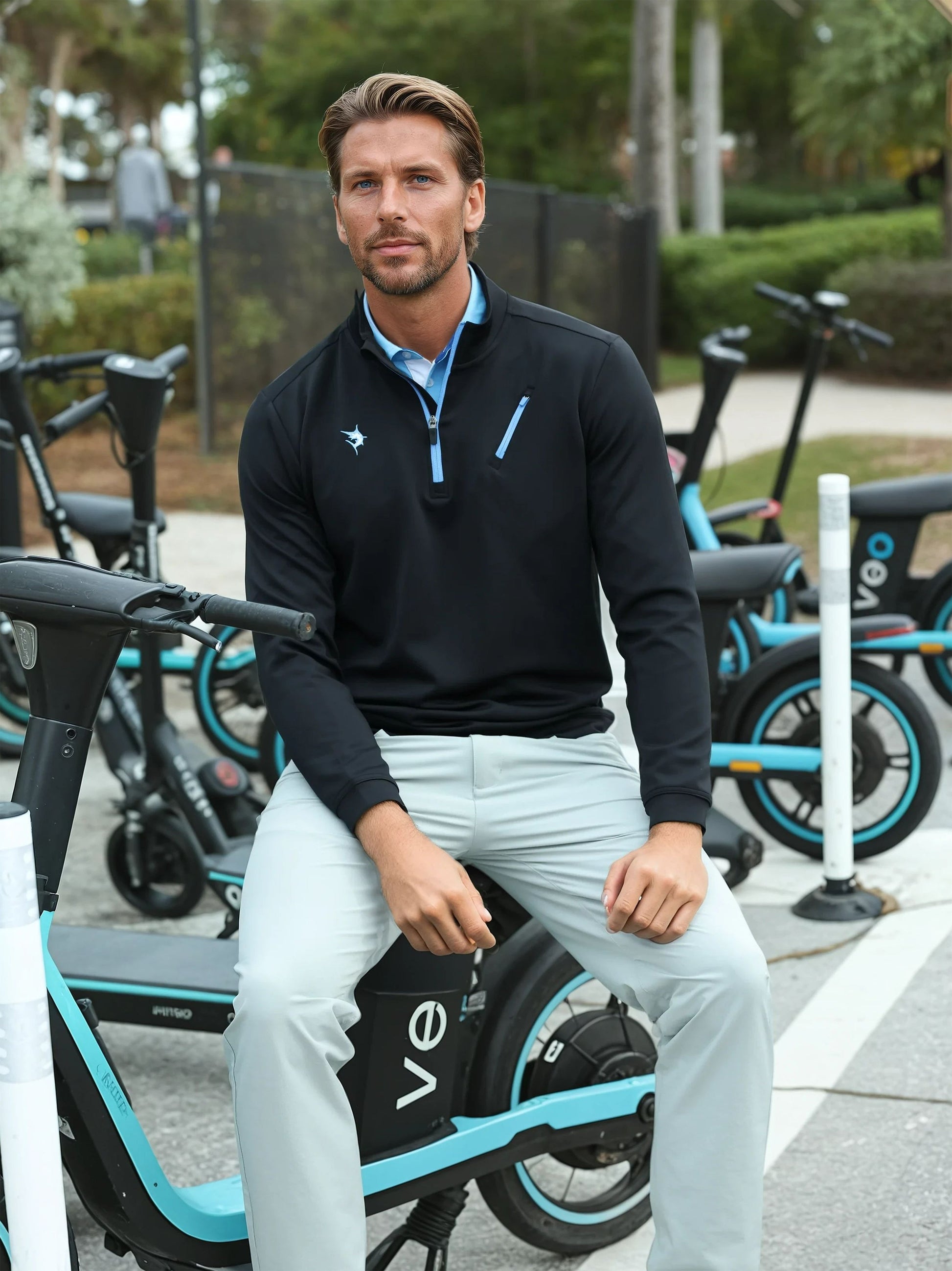 Black Oceanside Pullover by White Water Life, featuring smooth stretch fabric and casual fit, displayed on a mannequin.
