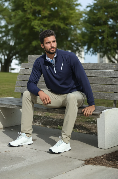 Navy Oceanside Pullover by White Water Life with smooth stretch fabric, displayed on a bench.