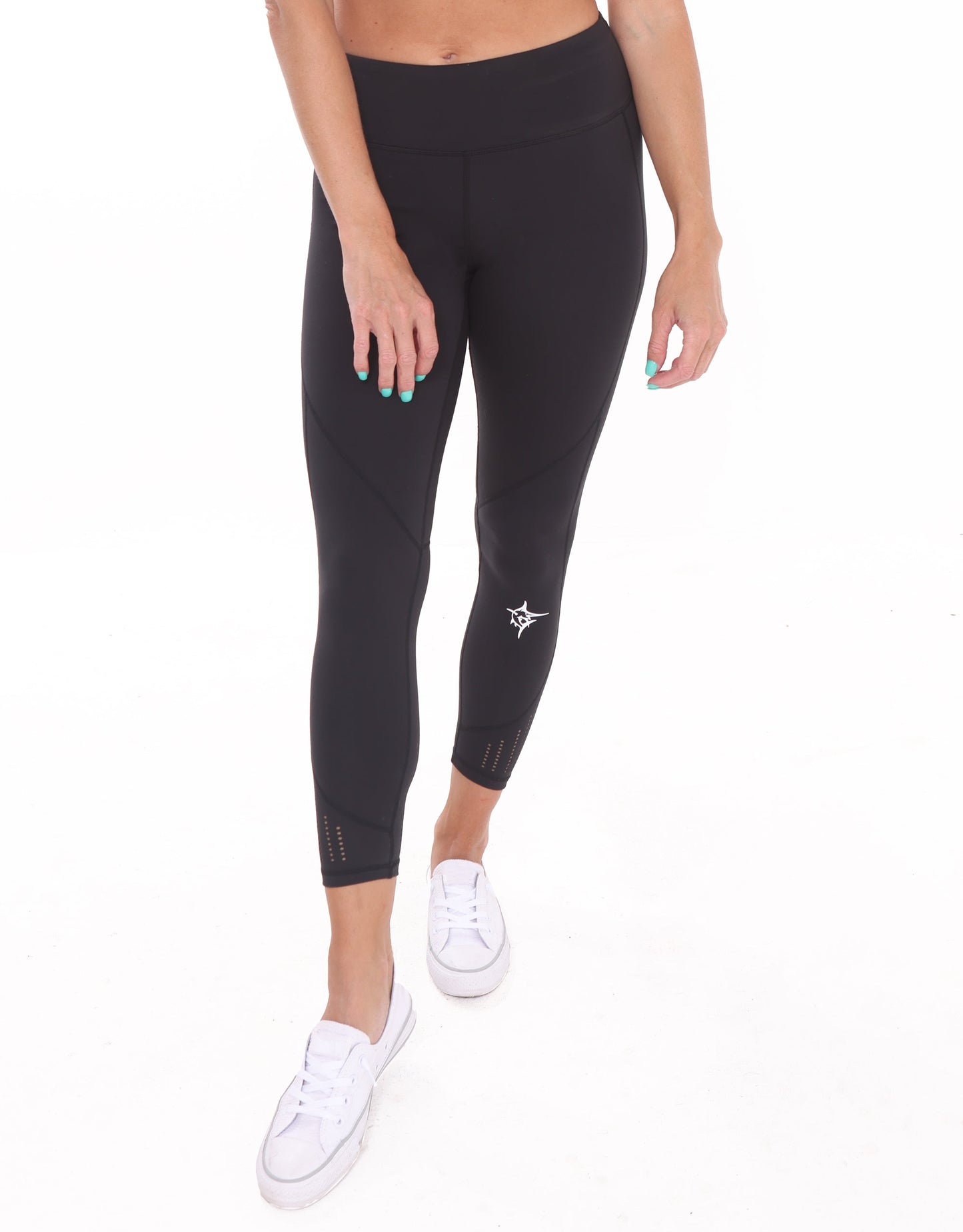 Black HydroFlex cut-out leggings by White Water Life, showcasing their sleek design and flexible fabric for active wear.