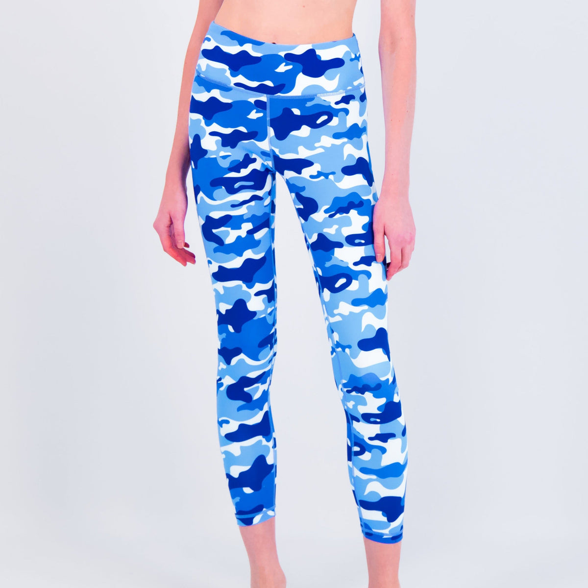 White Water Life water camouflage leggings with a snug fit, featuring a vibrant aquatic camo pattern for activewear or casual wear.
