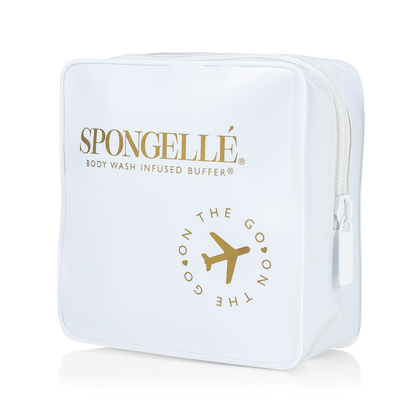 White Spongellé travel case with sturdy zipper and compact design for convenient storage of toiletries on the go.