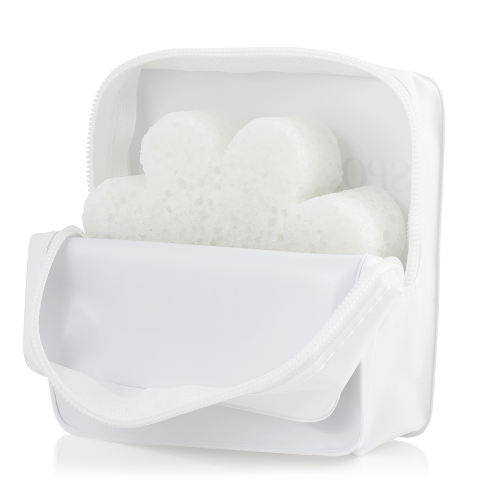White Spongellé travel case with zipper closure, compact shape, designed for storing toiletries and travel essentials.