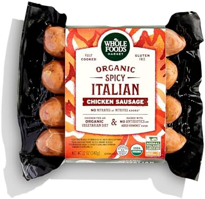 Whole Foods Market organic spicy Italian chicken sausage, 12 oz, uncooked, raw sausage links showing natural casing and seasoning.
