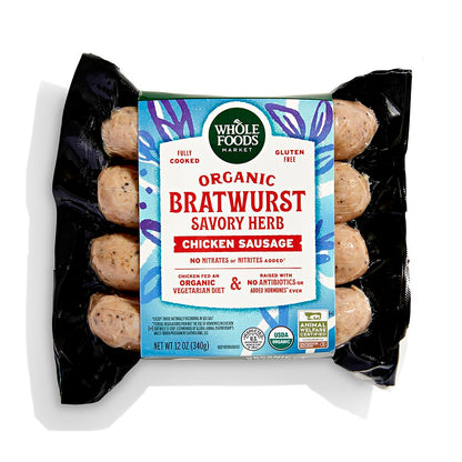 Whole Foods Market organic chicken bratwurst sausages in a 12 oz package, ready for grilling or cooking