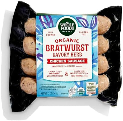 Whole Foods Market organic chicken bratwurst sausages in a 12 oz package, ready for grilling or cooking.