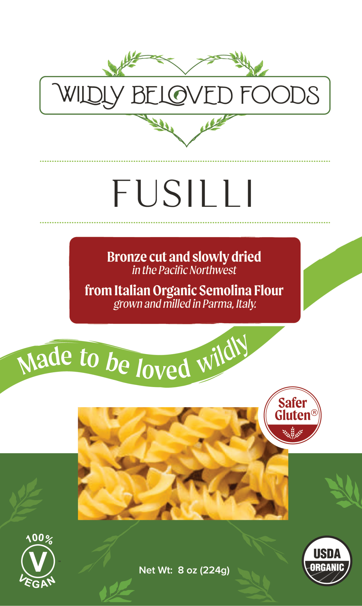 Dried vegan fusilli pasta from Wildly Beloved Foods, showing coiled pasta noodles ready for cooking.