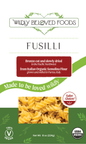 Dried vegan fusilli pasta from Wildly Beloved Foods, showing coiled pasta noodles ready for cooking.