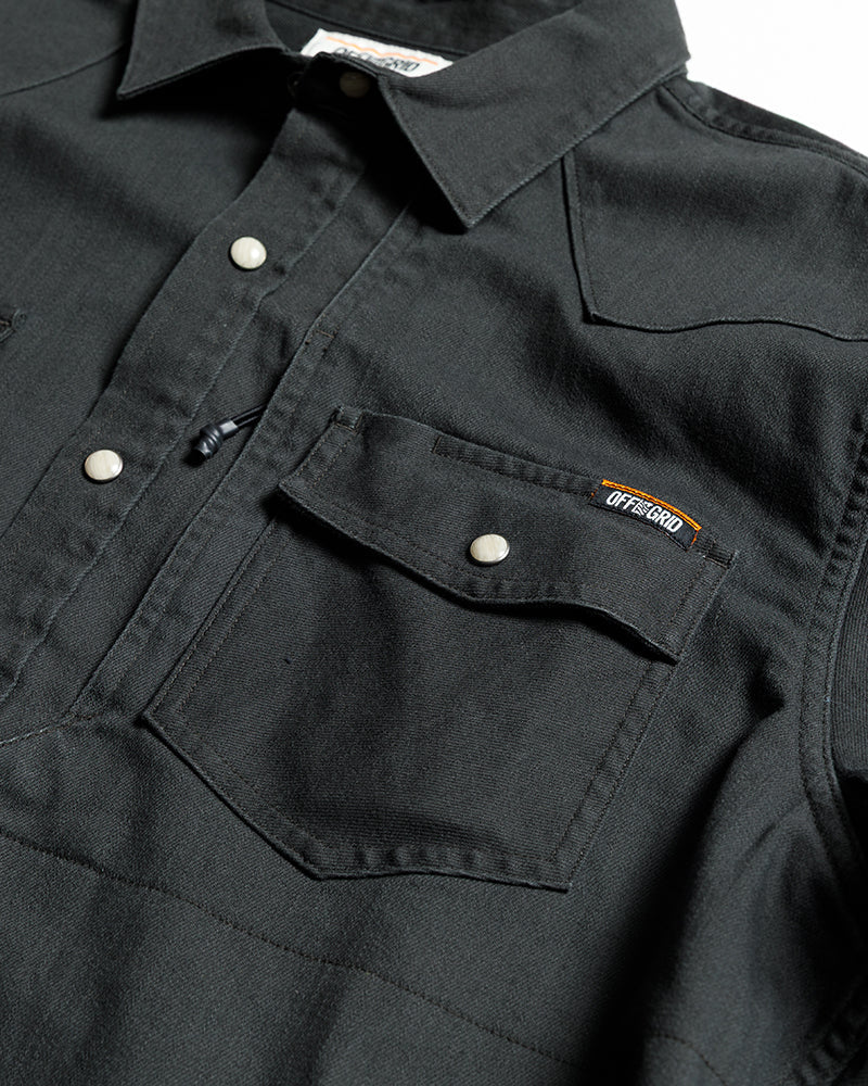 Vintage black Earl denim long sleeve shirt by Off The Grid Surplus, featuring woven black fabric and classic denim style.
