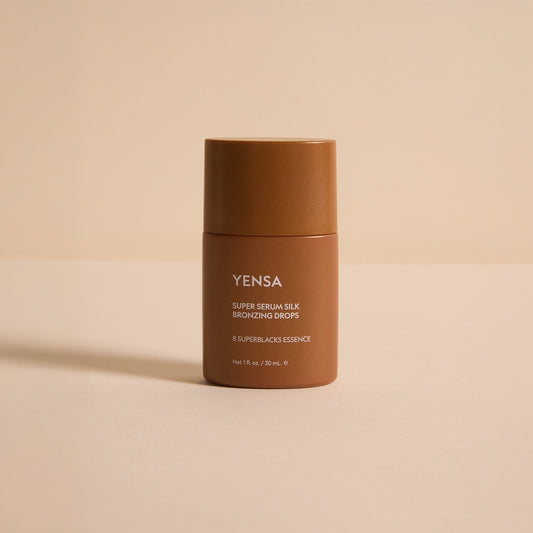 YENSA Super Serum Silk Bronzing Drops in a dropper bottle, highlighting their silky bronze liquid formula for a sun-kissed glow.