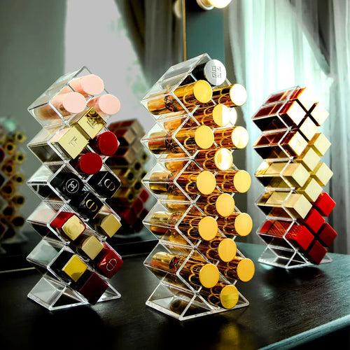 Acrylic 16-grid lipstick and jewelry organizer from Your Skin Icon, showing compartments for makeup brushes, lipsticks, and small accessories.