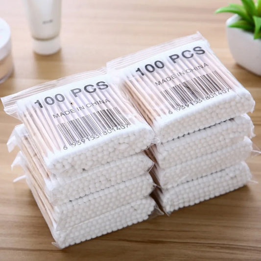Set of 500 double-headed cotton swab sticks for ear and nose cleaning, makeup application, and personal health care by Your Skin Icon.