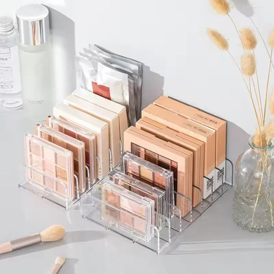 Clear makeup organizer box with 7 compartments for cosmetics, blush, and eyeshadow, durable and space-saving from Your Skin Icon.