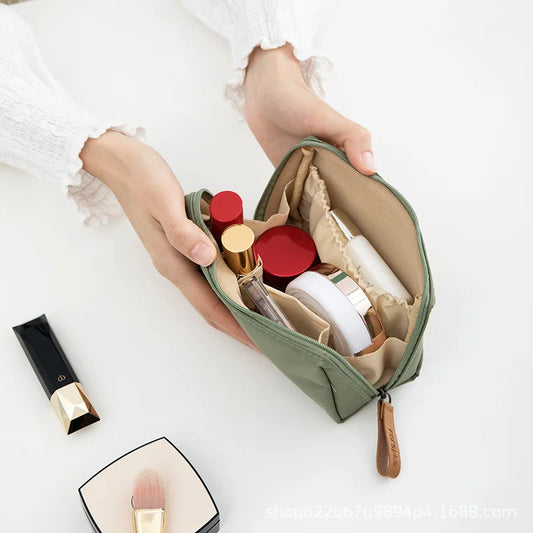Waterproof large capacity makeup bag by Your Skin Icon with multiple colors, featuring compartments for cosmetics and lipsticks.