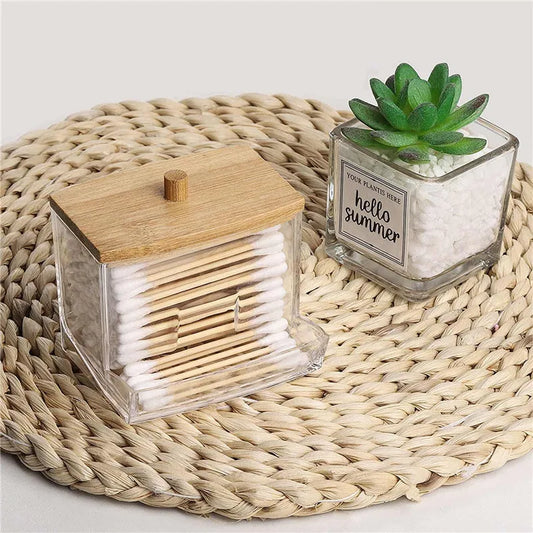 Your Skin Icon bathroom organizer set with clear plastic lids, includes makeup holder, cotton ball and swabs dispenser, and storage jars.