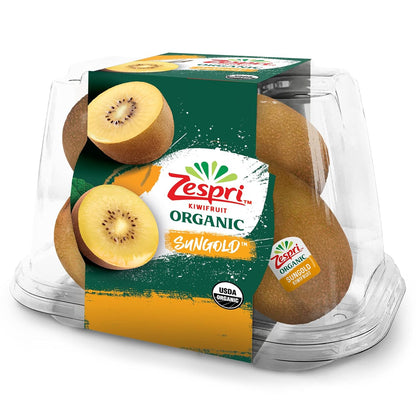 Zespri Organic Gold Kiwis on a white surface, showcasing ripe, golden-yellow kiwifruit with smooth skin.